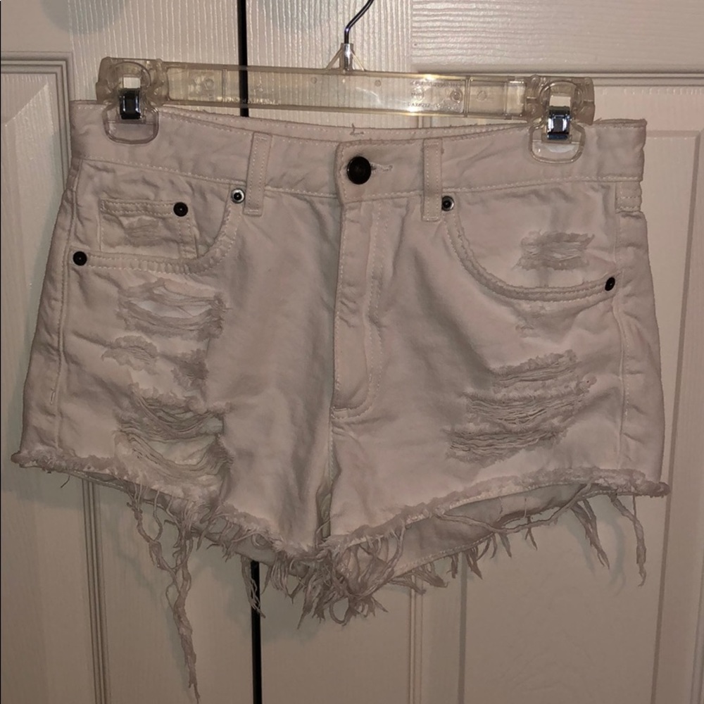 White distressed jean shorts